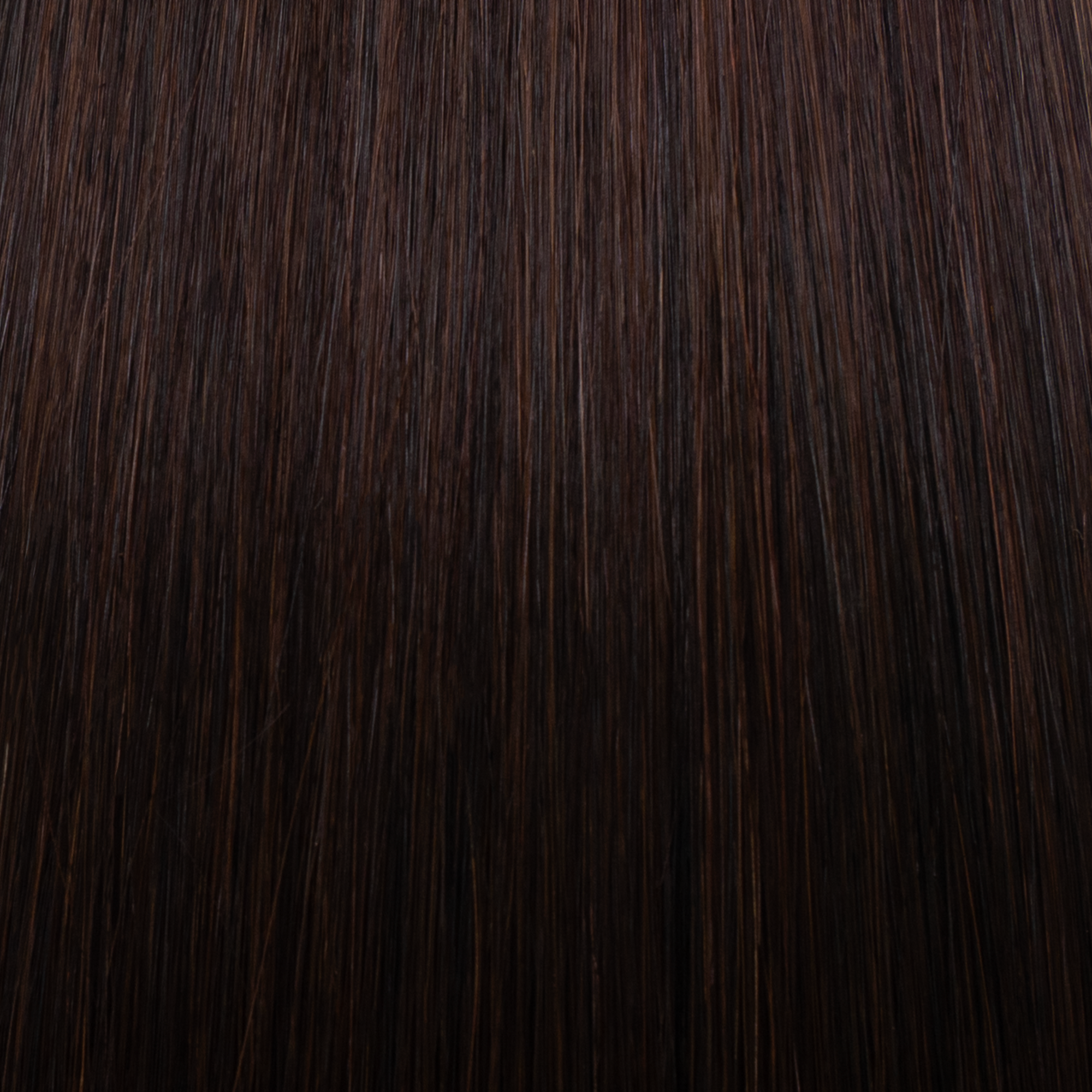 Texture ravvicinata extension a microtessitura Paradise colore castano fondente, extension capelli veri 100% disponibili per vendita online e applicazione professionale in salone a Milano Duomo e Corso Buenos Aires, effetto naturale, volume e lunghezza perfetta.