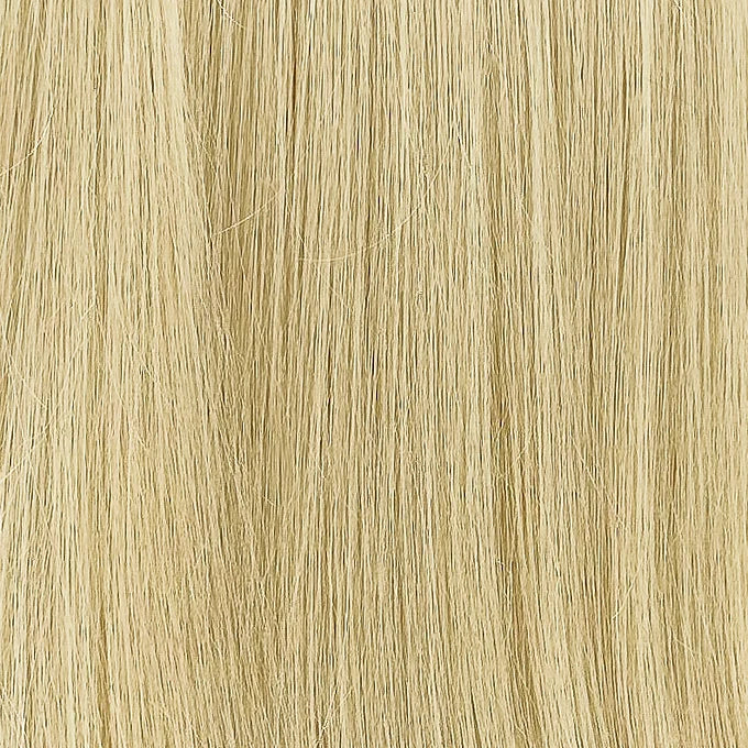 Biondo chiaro caldo in capelli veri: extension sottilissime, morbide e con volume pieno fino alle punte, per un look naturale ed elegante