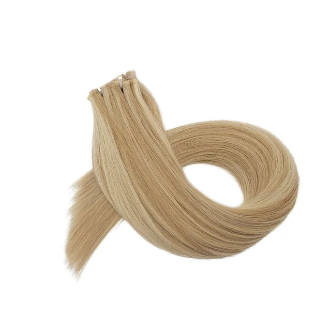 Extension Paradise in capelli veri balayage biondo cenere scuro: sfumature eleganti, naturalezza impeccabile e qualità superiore per un look raffinato e luminoso.