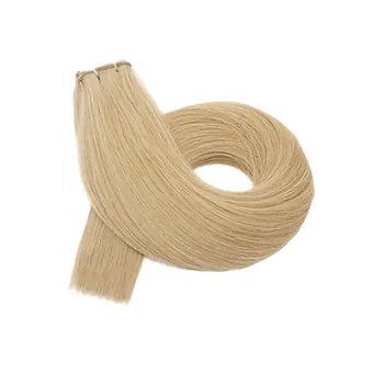 Extension capelli veri biondo chiaro caldo: colore raffinato, morbidezza superiore e applicazione con tecnica professionale avanzata.