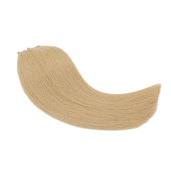 Extension capelli veri biondo chiaro caldo: colore raffinato, morbidezza superiore e applicazione con tecnica professionale avanzata.
