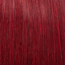 Texture ravvicinata extension a microtessitura Paradise colore mogano, capelli veri 100% con riflessi rossi intensi e luminosi, disponibili per vendita online e applicazione professionale nei saloni Paradise Milano Duomo e Corso Buenos Aires.