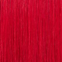 Texture ravvicinata extension a microtessitura Paradise colore rosso fuoco, capelli veri 100% intensi e luminosi, disponibili per vendita online e applicazione professionale nei saloni Paradise Milano Duomo e Corso Buenos Aires.