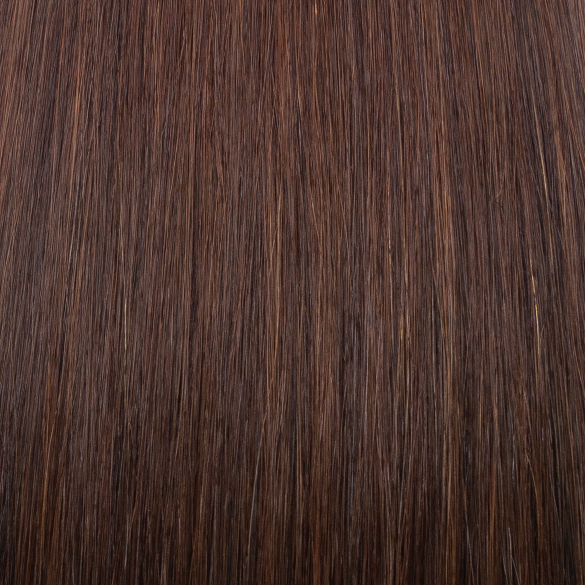 exture ravvicinata extension a microtessitura Paradise colore castano, extension capelli veri 100% disponibili per vendita online e applicazione professionale nei saloni Paradise Milano Duomo e Corso Buenos Aires, effetto naturale, volume e lunghezza perfetta.