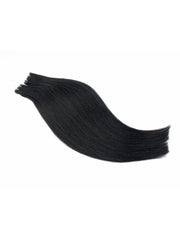 Tessitura di capelli veri in colore nero intenso, ideale per chi desidera uno stile audace e di impattoTessitura di capelli veri in colore nero intenso, ideale per chi desidera uno stile audace e di impatto
