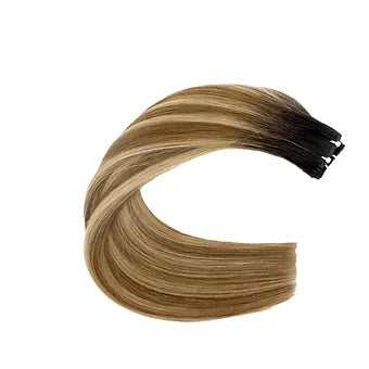 Le Extension Capelli Veri Paradise in balayage biondo scuro offrono una transizione cromatica perfetta, dal castano al biondo