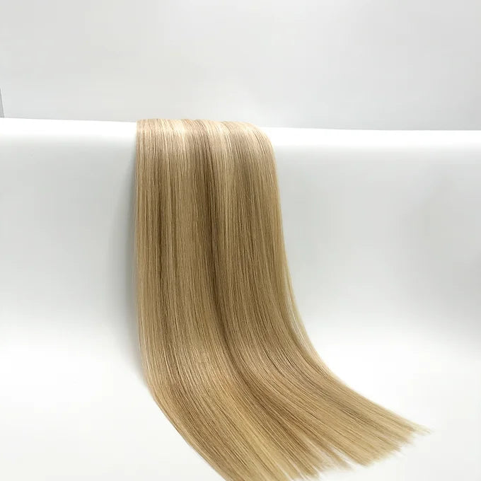 Extension Paradise presenta: capelli veri color balayage biondo cenere scuro per un look moderno e raffinato