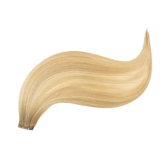 Extension Capelli Veri Paradise in balayage biondo cenere scuro: sfumature naturali e luminose, volume pieno e lunghezza impeccabile per un look raffinato e ultra moderno.