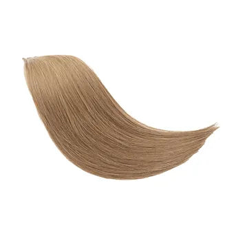 Tessitura in capelli veri biondo leggermente scuro: extension eleganti, morbide e luminose per un look raffinato