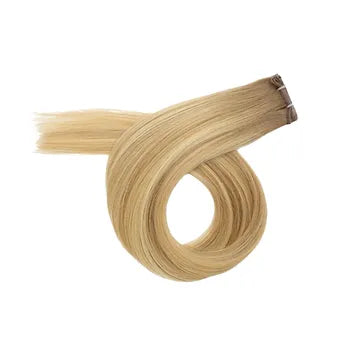 Le Extension Capelli Veri Paradise con colore balayage biondo cenere scuro offrono un effetto sfumato che valorizza la tua chIoma