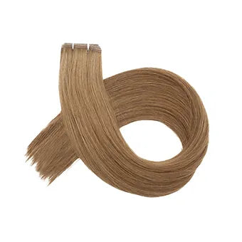 Tessitura in capelli veri biondo leggermente scuro: extension eleganti, morbide e luminose per un look raffinato