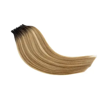 Le Extension Capelli Veri Paradise in balayage biondo scuro offrono un effetto sfumato naturale e sofisticato. 