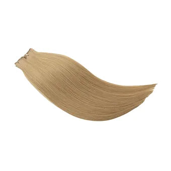 Le Extension Capelli Veri Paradise in biondo vaniglia sono ideali per chi desidera un colore chiaro, raffinato e luminoso. Morbide, naturali e di qualità premium per un look impeccabile.