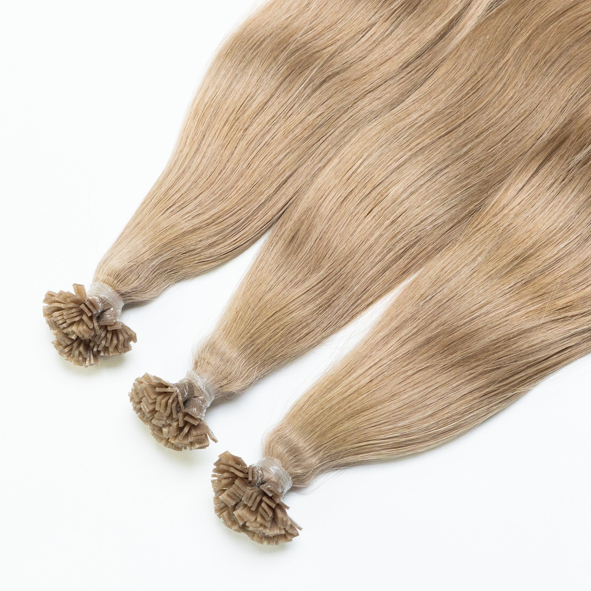 Extension microcheratina 5 Biondo Sabbia Paradise Beauty in capelli veri per un effetto naturale, luminoso e delicato.