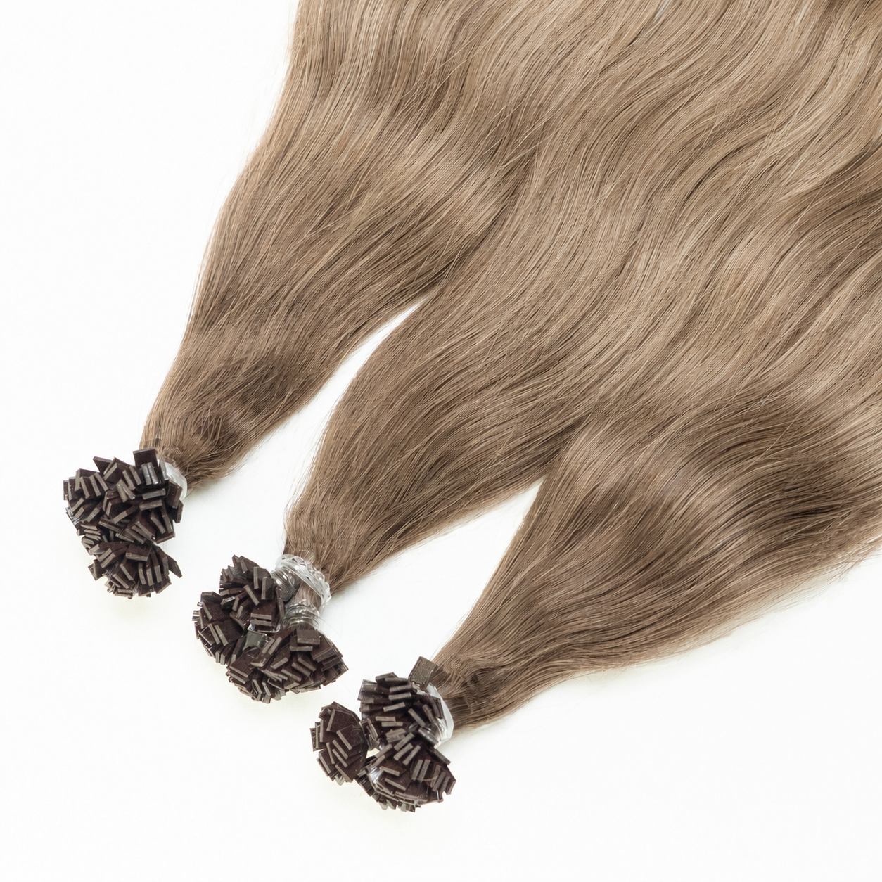 Extension microcheratina 6 Biondo Scuro Cenere Paradise Beauty in capelli veri per un effetto naturale, freddo e luminoso.